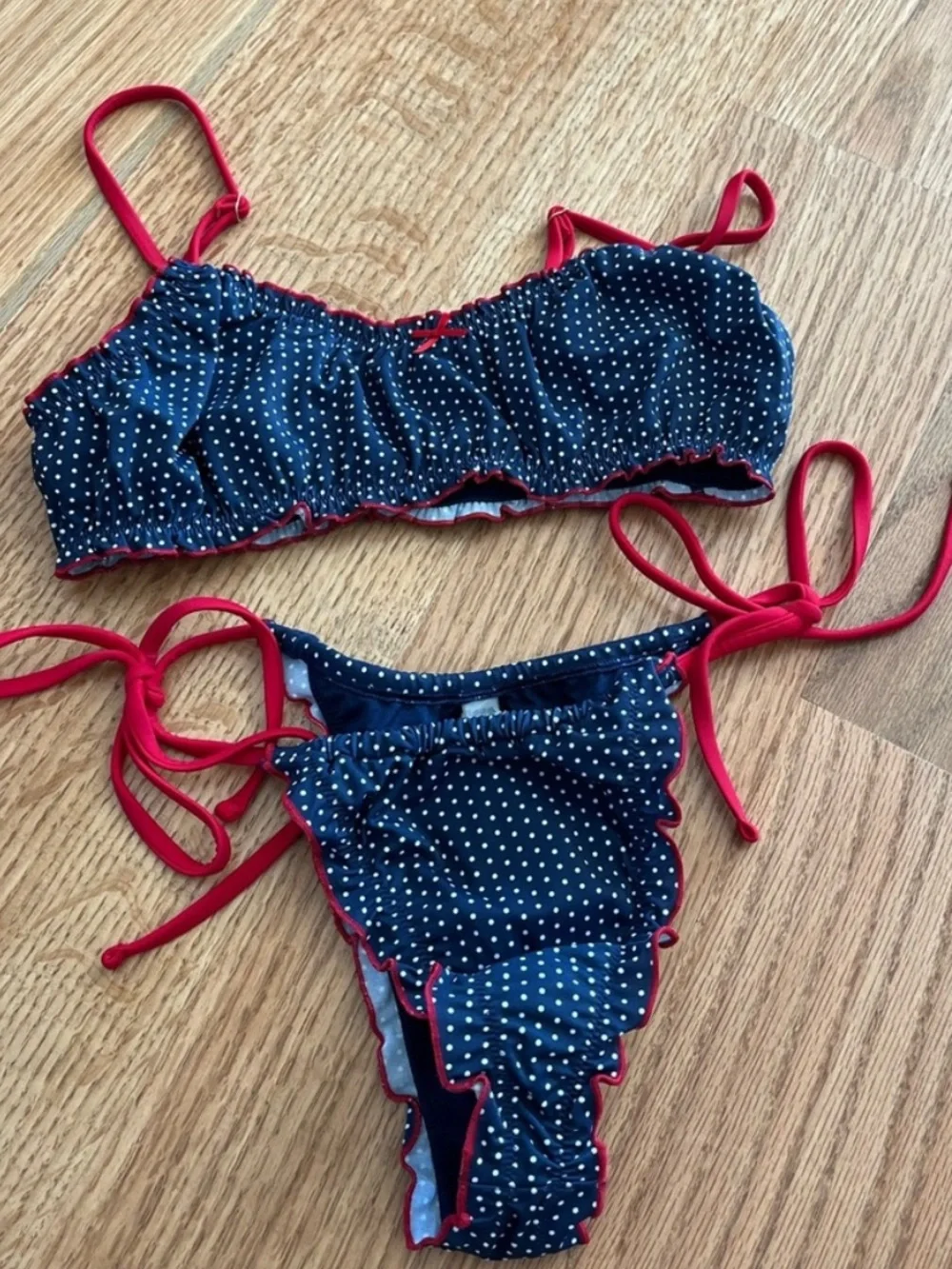 Frankie's Bikinis Navy Polka Dot Bikini with Red Trim